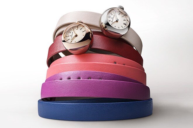 Two Lady B watches on stacked coloured leather straps